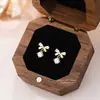 Pendientes de Plata Pura S999 con Lazo Dulce y Circonita para Mujer Lujo Accesible Diseño de Nicho de Gama Alta Pendientes con Corazón Femenino Día de San Valentín Chino