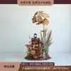 Escena de decoración de escaparate de tienda de ropa con flores de otoño, juncos, hierba y flores secas para una transmisión en vivo con temática femenina