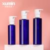 Botella cosmética de plástico PET azul transparente, subbotella de loción de 100-200 ml, botella de prensa para desmaquillante corporal de 250 ml