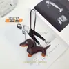 Nuevos adornos de cuerda para la mano con forma de salchicha, colgante para bolso con forma de animal de dibujos animados, regalo decorativo
