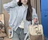 Jaqueta Curta Casual Versátil Feminina Primavera Outono Nova Solta Fashionável Jaqueta Petite Emagrecedora Jaqueta Baseball Top