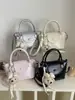 Bolso de mujer de alta gama transfronterizo, nuevo y popular bolso de mano exquisito para salir del verano de 2026, bolso de hombro y cruzado para el trabajo