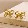 Europa y Estados Unidos nuevo anillo de lazo chapado en oro de 18 quilates acero inoxidable simple moda Joker anillo fabricantes venta al por mayor