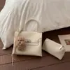 Bolsa de Jardim Patchwork em Lona Colorida Contrastante para Mulheres 2025 Nova Bolsa de Mão de Nicho Bolsa Tote de Primavera Super Popular Bolsa de Ombro Transversal