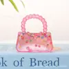 Bolso de mano de frutas Little Red Book transfronterizo, juguete de apretar con jarabe de malta para alivio del estrés y juguete de descompresión de rebote lento, venta al por mayor
