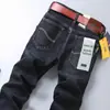 Pantalones vaqueros elásticos para hombre, directos de fábrica, informales, versátiles, de cintura alta, holgados, para negocios, otoño e invierno.