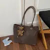 Bolso Tote Grande de Textura Tejida Retro Melanoid 2026 Otoño Nuevo Elegante de Alto Valor Bolso de Hombro Único