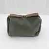 Bolsa de maquiagem portátil feminina transfronteiriça, pequena bolsa de armazenamento de viagem, organizador de cosméticos e batom, à prova d'água de alta qualidade