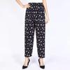Pantalones para Mujer de Mediana Edad Primavera y Otoño Elásticos Seda Helada Pantalones Florales de Madre Sueltos Talla Grande Casuales Recortados Rectos