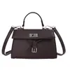 Bolso vintage de nicho de alta gama para mujer, nuevo bolso cruzado casual de otoño 2026, bolso de mano cuadrado pequeño súper popular