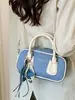 Nova moda outono de 2026, bolsa Boston simples texturizada, bolsa de ombro e transversal vintage de alto valor em formato de travesseiro