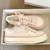 Zapatos planos de lona de caña baja 2026 nuevo estilo pastoral primavera-verano zapatos casuales florales zapatillas coreanas con ribete de encaje