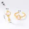 Anillo Abierto Vintage Chapado en Oro de Lujo Ligero Diseño de Nicho Cristal Rosa Torcido Amatista Calabaza Versátil para Mujeres