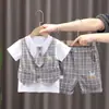 Moda Roupa Infantil Gola Redonda Falso Duas Peças Shorts de Manga Curta Conjunto Meninos e Meninas Crianças Bebê Verão Novo Conjunto de Manga Curta Tendência