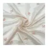 Tela Tencel en stock con bordado de pequeñas flores de cuentas para vestidos de mujer, vestidos de gasa y vestidos lenceros. Tela de diseño al por mayor