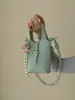Bolso bandolera de piel suave con patrón de lichi, bolso de mano para mujer, sensación de alta gama, adecuado para el trabajo y los desplazamientos, bolso bandolera pequeño versátil para el teléfono