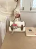 Bolsa Pequena Simples de Mão Estilo Coreano para Mulheres 2026 Nova Versátil Moda Bolsa Cambridge Nicho Elegante Bolsa Transversal para o Dia a Dia
