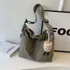 2026 Nova Bolsa de Tecido de Nylon Bolsa Tote Feminina Grande Capacidade Verão Transversal Versátil Bolsa de Ombro para Aula e Deslocamento