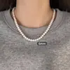 Colar de Pérolas Shijia Feminino Nicho Leve Design de Luxo Advanced Sense Simples Elegante Clavícula Corrente Botão Dourado Corrente de Lã