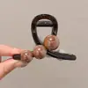 Pinza para el cabello de tamaño mediano de lunares blancos y negros estilo francés, diseñada para la parte trasera de la cabeza, un accesorio para el cabello nuevo y elegante con un aspecto sofisticado y con estilo
