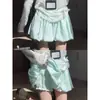 Calça Saia de Botão de Flor Fofa Verde Menta para Mulheres, Novo Estilo de Verão, Meia Saia Anti-Exposição, Cintura Alta, Emagrecedora, Plissada, Linha A, Curta