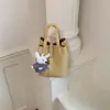 Bolso de Textura Simple de Alta Gama con Diseño de Nicho para Mujer Transfronterizo 2026 Nuevo de Primavera Bolso Cubo Bolso Cruzado de Hombro Único