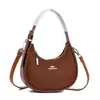 Bolsa 2026 Nova Bolsa de Mão Meia-Lua Moda Feminina Nicho Bolsinha de Ombro Casual Simples para o Trabalho Ombro Único Feminino