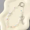 Ins Nuevo Colgante de Llavero con Lentejuelas y Lazo de Perlas para Funda de Teléfono Móvil Accesorios de Correa de Muñeca para Lanyard de Teléfono Móvil