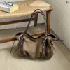 Bolso de gamuza para mujer, nueva colección otoño/invierno 2026, bolso de hombro retro, adecuado para el trabajo y los desplazamientos, gran capacidad, estilo de bolso almohada