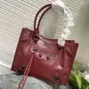 Nueva Bolsa de Motocicleta Paris Rivet de Moda, Bolsa Abg Hot Girl con un Toque de Alta Gama, Gran Capacidad, Hombro Único, Cruzada y Bolso de Mano para Mujer