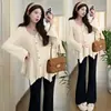 Conjunto de Maternidad 2026 Tejido de Punto de Primavera Moda Diseño Irregular Top de Maternidad Pantalones con Soporte para el Vientre Ligeramente Acampanados