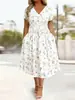 Vestido Feminino Europeu e Americano de Verão 2026 Novo com Gola V Estampado Slim Fit Elegante de Manga Curta