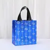 Bolsa de Regalo con Impresión Láser Transfronteriza Bolsa Creativa de Dulces para Niños Laminada Impermeable Portátil Bolsa No Tejida Venta al por Mayor