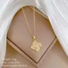 [Acero de Titanio] Hierba de la Suerte Giratoria Lavado Hueco Micro Incrustación Conjunto de Collar y Pendientes Lujo Ligero Personalidad Pendientes Elegantes Conjunto de Collar