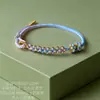 Festival del Bote del Dragón Pulsera Ovalada de Cuerda de Cinco Colores Nudo de Flor de Durazno Tejido a Mano Forma de Gota de Agua Muñeca de Cuerda Roja Adorno de Mano Producto al por Mayor