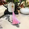 Venta Directa de Fábrica Colgante de Borla de Trébol de Cuatro Hojas Cloisonné Estilo Chino Hanfu Botón a Presión Línea Fina Borla Vertical Accesorio