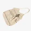 Nova bolsa feminina de crochê em fio de algodão, estilo casual, de ombro único, com design vazado, grande capacidade, perfeita para férias e a praia, uma bolsa versátil
