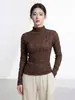Top de mujer de alta gama Shenzhen Nanyou, elegante suéter irregular de color liso, camiseta base de manga larga ajustada estilo Issey Miyake