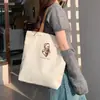 Bolsa de Lona para Mulheres 2025 Nova Estudante Grande Capacidade Bolsa de Mão Estilo Literário Preppy Bolsa Tiracolo Simples Bolsa de Ombro Estampada