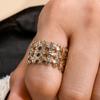 Tendencia europea y americana personalidad hip-hop moda apertura ajustable anillo trenzado de diamantes completos raya vertical hueco anillo de tres capas
