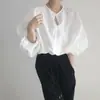 Corea del Sur verano nuevo elegante cuello redondo un botón diseño hueco suelto manga de farol protección solar camisa top