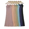 Venta al por mayor de ropa de mujer transfronteriza 2026 verano nuevo estilo europeo y americano color liso ajustado tirantes vestido largo