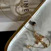 Collar Dorado Vintage Cruzado para Mujer Otoño e Invierno, Cadena Larga de Suéter de Lujo Ligero de Gama Alta, Accesorio Exquisito Retro de Nicho