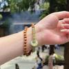 Nuevo Pulsera de Doble Círculo con Hebilla de Paz Estilo Chino, Imitación de Jade Hetian para Mujer, Diseño de Nicho con Acabado de Alta Gama, Nuevo Estilo Sencillo 2024