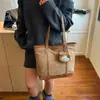 Bolso de Mano Grande de Textura para Estudiantes Viajeras para Mujer 2025 Otoño e Invierno Nuevo Bolso Tote de Hombro Casual Elegante de Nicho