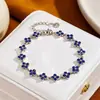 Pulseira de strass branco transfronteiriça com diamantes coloridos, toque de luxo leve e alta qualidade, estilo de moda europeu e americano, pulseira feminina de alta qualidade atacado