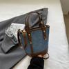 Bolsas de nicho coreanas para mulheres 2024 Novas bolsas versáteis de verão Estilo popular e quente Bolsa transversal de ombro único Bolsa de balde