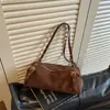Bolso de hombro vintage de gran capacidad estilo coreano para el trabajo y los desplazamientos, moda de invierno 2026, bolso casual simple para debajo del brazo para mujer