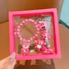 Pulsera nueva para niños 2024 anillo lindo para niña pequeña clip para la oreja de dibujos animados para bebé niña traje de joyería para niña venta al por mayor