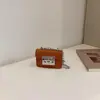 Bolso de Hombro Mini Ligero de Lujo para Labial para Mujer 2026 Primavera Nuevo Color Sólido Cadena de Bloqueo Bolso Cuadrado Cruzado